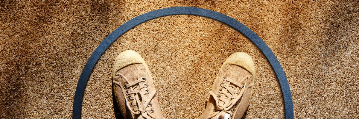 Setting Boundaries | Shanti Psychotherapy | Image from Canva | Image of a person wearing sneakers standing inside a circle.